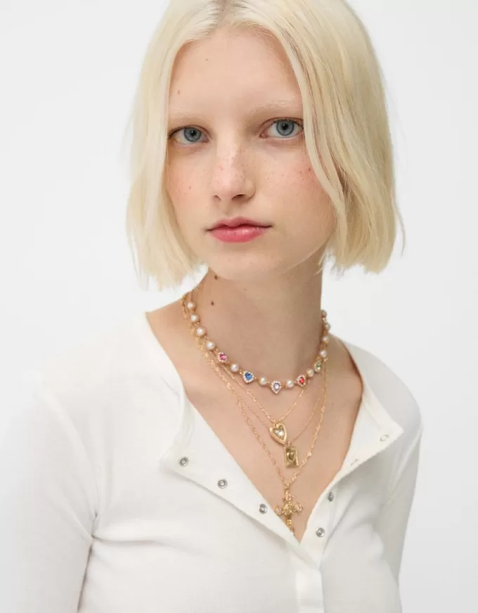 4-pack of rhinestone cross necklaces