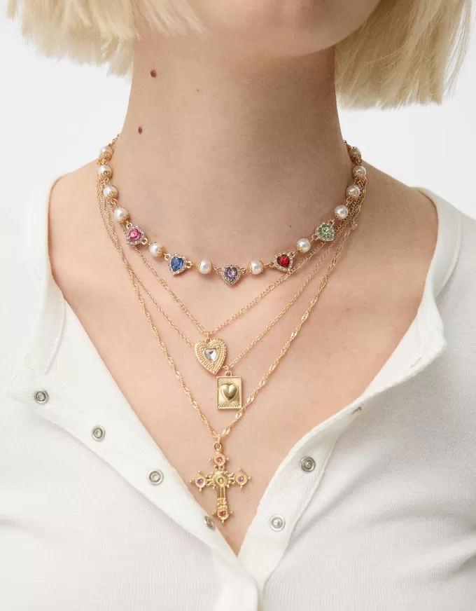 4-pack of rhinestone cross necklaces