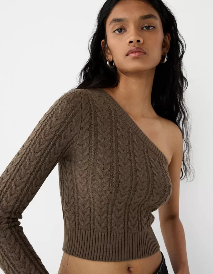 Asymmetric cable-knit sweater