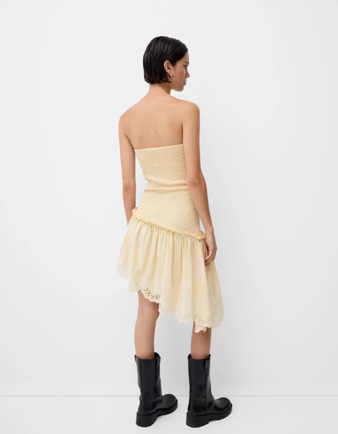Asymmetric dress with shirred elastic detail