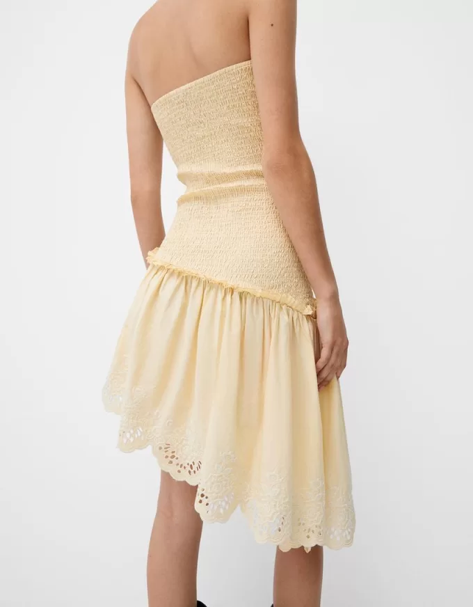 Asymmetric dress with shirred elastic detail