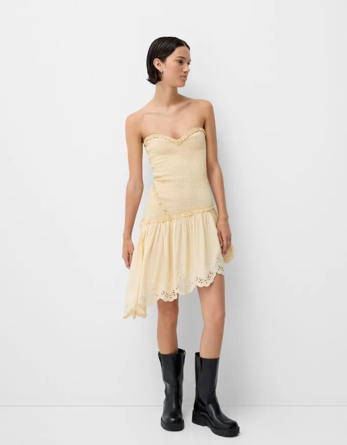 Asymmetric dress with shirred elastic detail