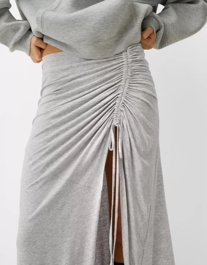 Asymmetric midi skirt with ruffles