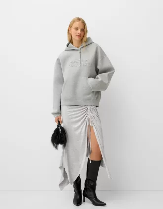 Asymmetric midi skirt with ruffles