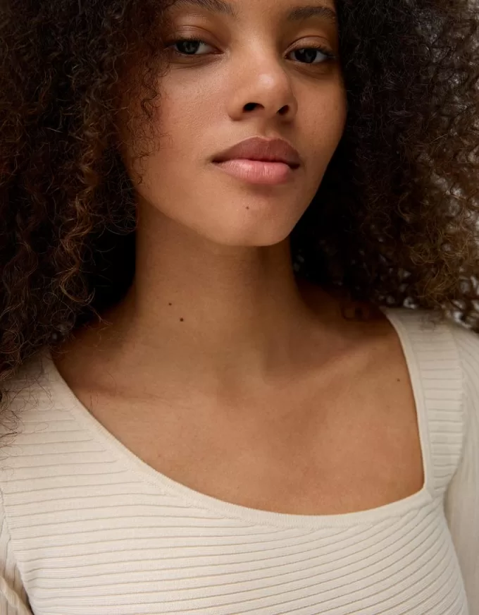 Asymmetric ribbed sweater