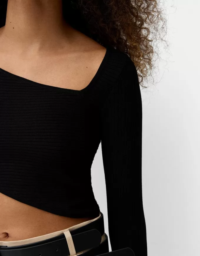 Asymmetric ribbed sweater