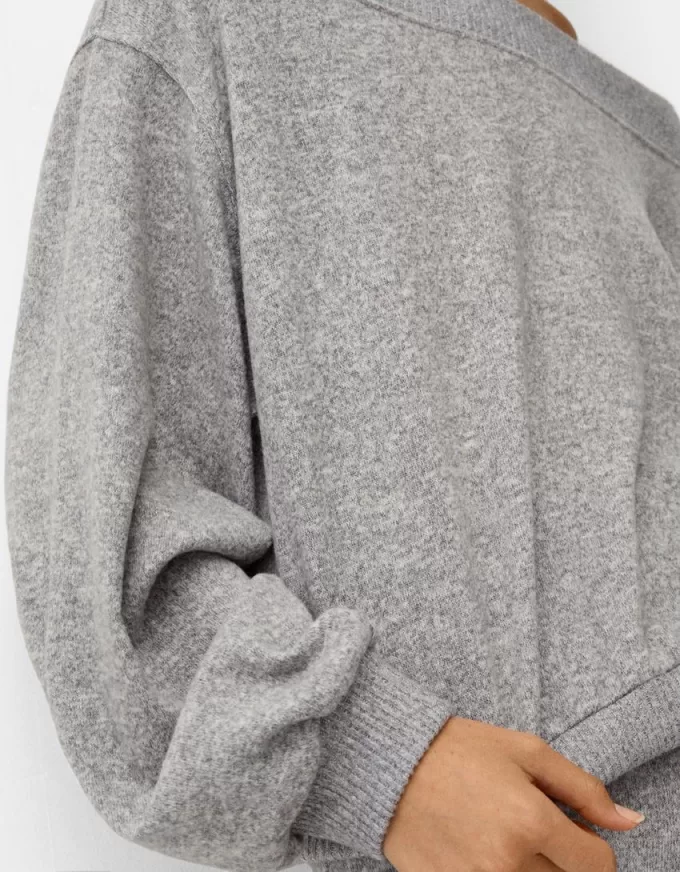 Asymmetric soft touch sweater