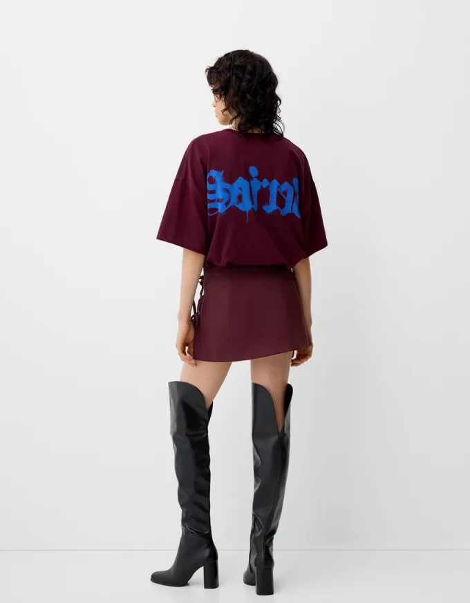 Box pleat mini skirt with bow detail Box pleat mini skirt with bow detail