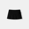 Box pleat mini skirt with bow detail Box pleat mini skirt with bow detail