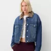 Denim jacket with animal print faux fur collar