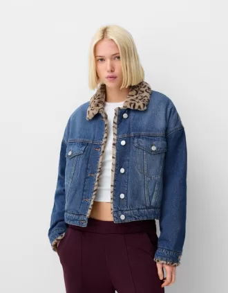 Denim jacket with animal print faux fur collar
