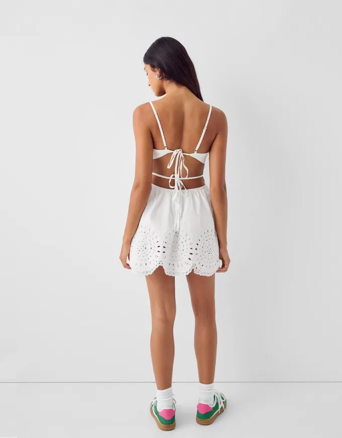 Die-cut flared mini dress