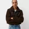Double-sided jacket with faux shearling sleeves