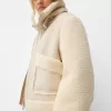 Double-sided jacket with faux shearling sleeves