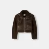 Double-sided jacket with faux shearling sleeves