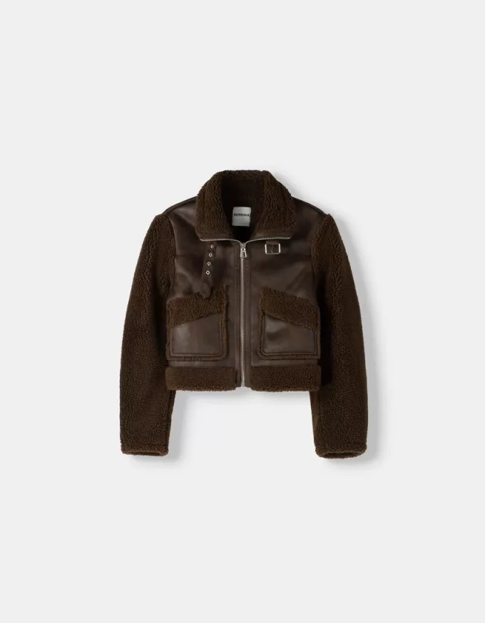 Double-sided jacket with faux shearling sleeves