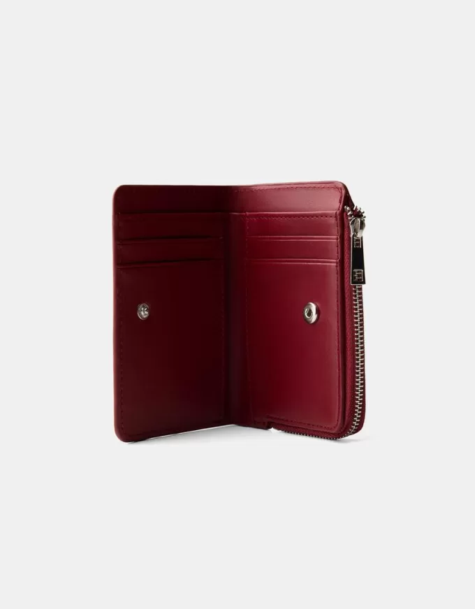 Embossed faux-patent finish animal print purse Embossed faux-patent finish animal print purse