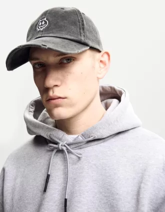 Embroidered ripped cap