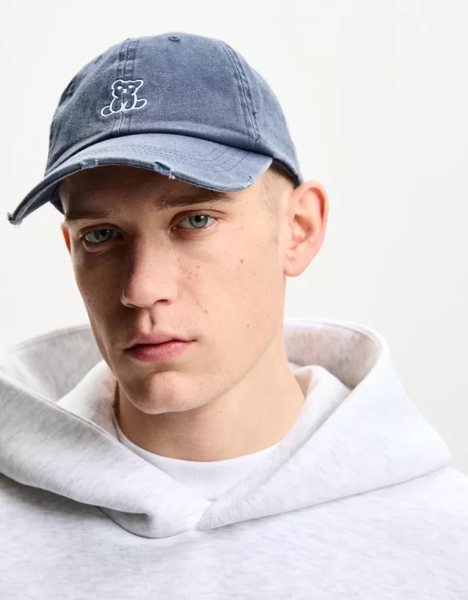 Embroidered ripped cap