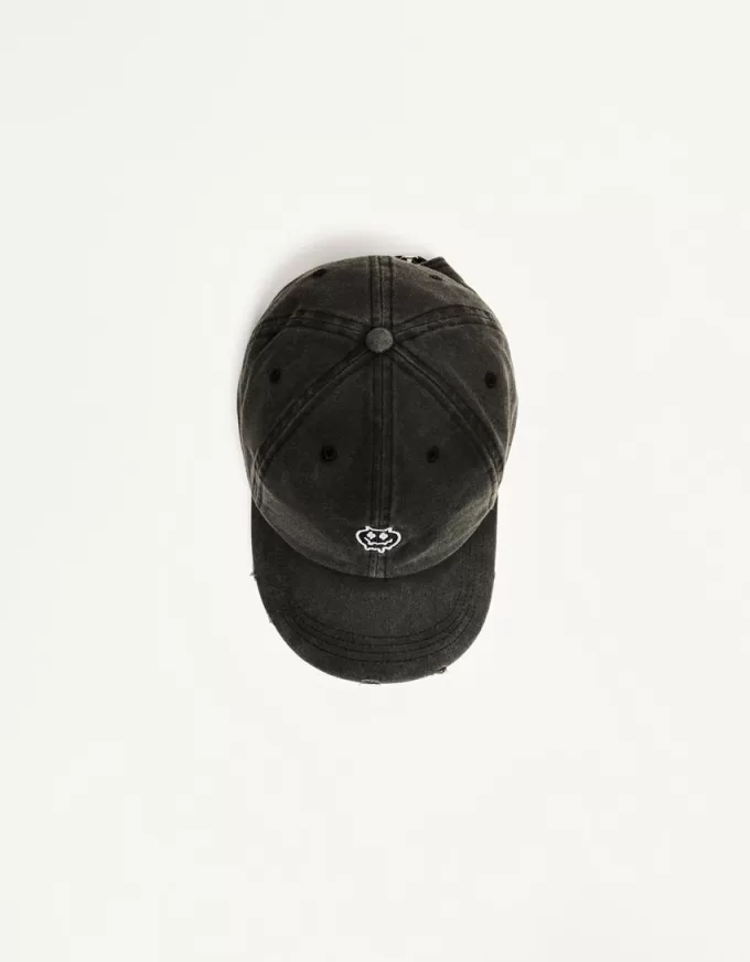 Embroidered ripped cap