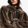 Faux fur jacket with contrast leather effect detail Faux fur jacket with contrast leather effect detail