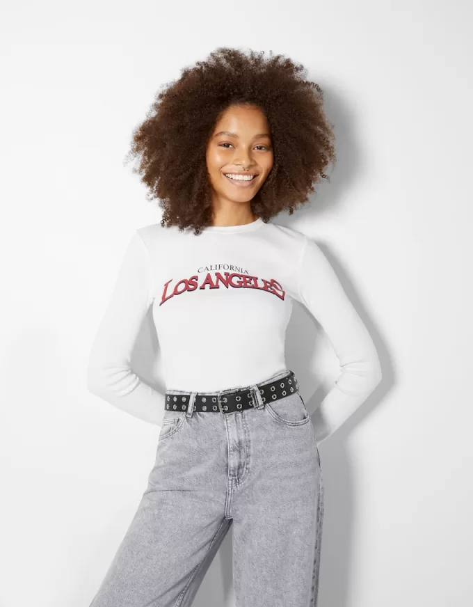 Faux leather belt with eyelets Faux leather belt with eyelets