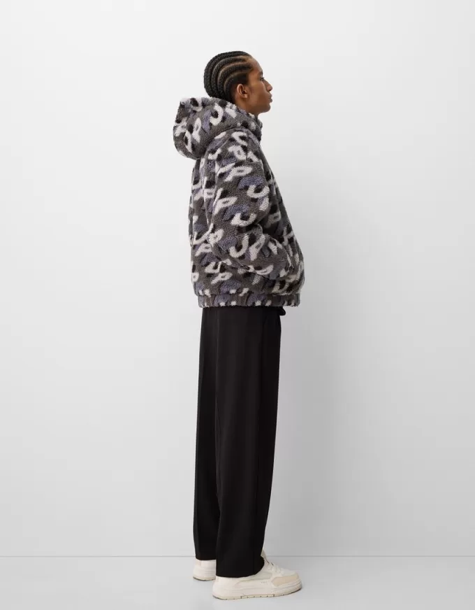 Faux shearling jacket with print