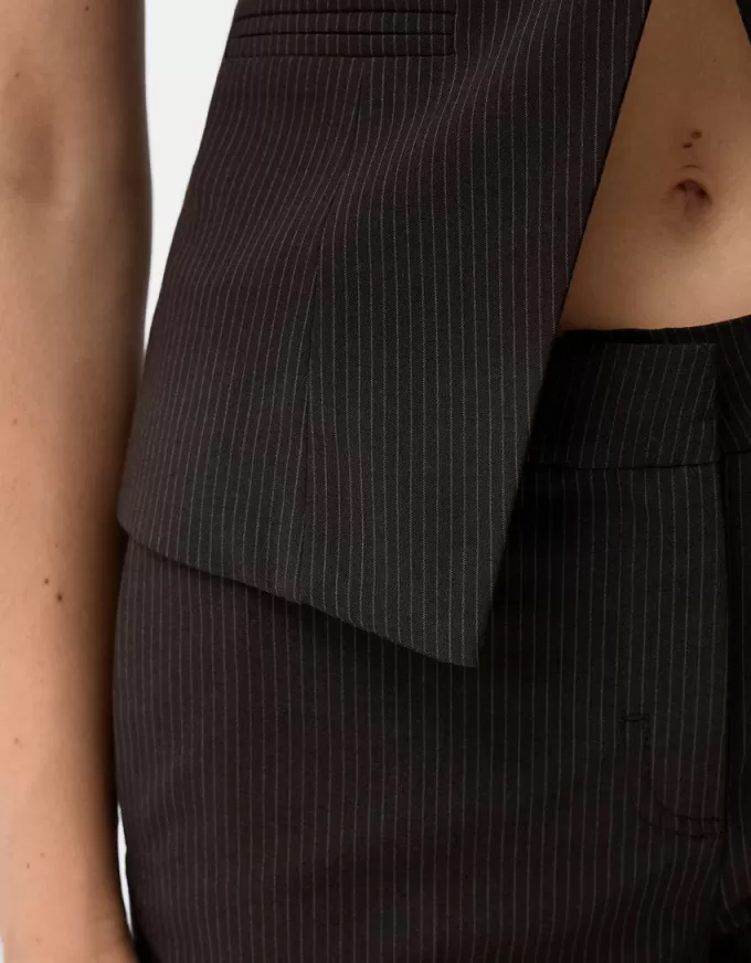 Fitted buttoned vest Fitted buttoned vest