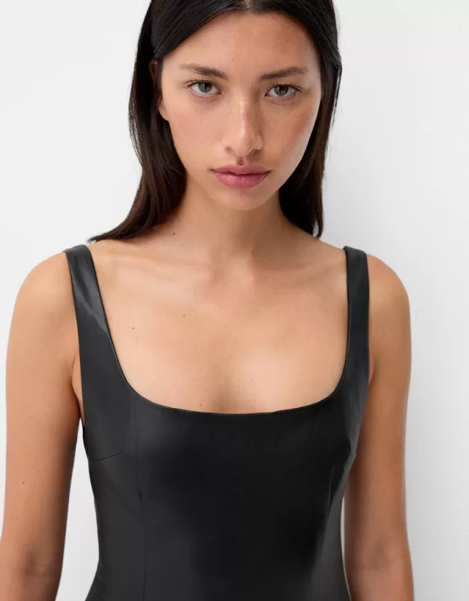 Fitted leather effect mini dress Fitted leather effect mini dress