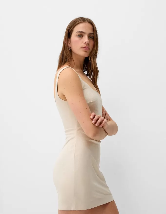 Fitted leather effect mini dress Fitted leather effect mini dress