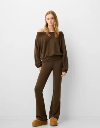 Flared pants with fold-over waist