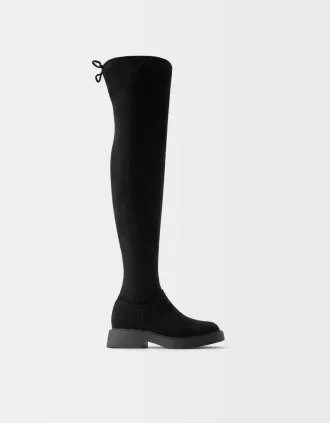 Flat fitted knee-high boots