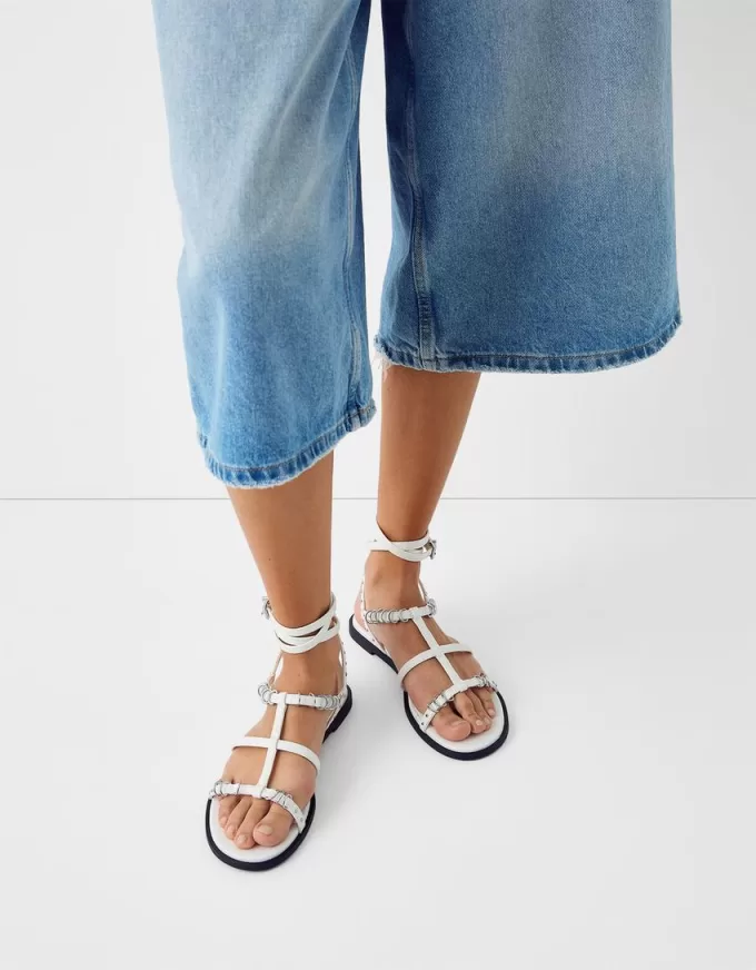 Flat sandals with ring details Flat sandals with ring details