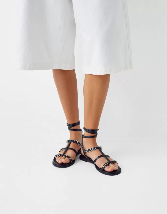 Flat sandals with ring details Flat sandals with ring details