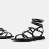 Flat sandals with ring details Flat sandals with ring details