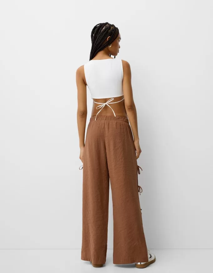 Flowing pants with side ties Flowing pants with side ties