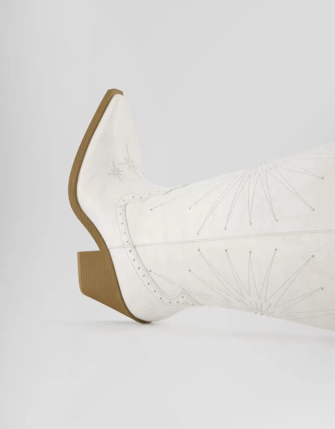 High-heel cowboy boots with studded detail High-heel cowboy boots with studded detail