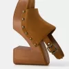 High-heel studded platform clogs