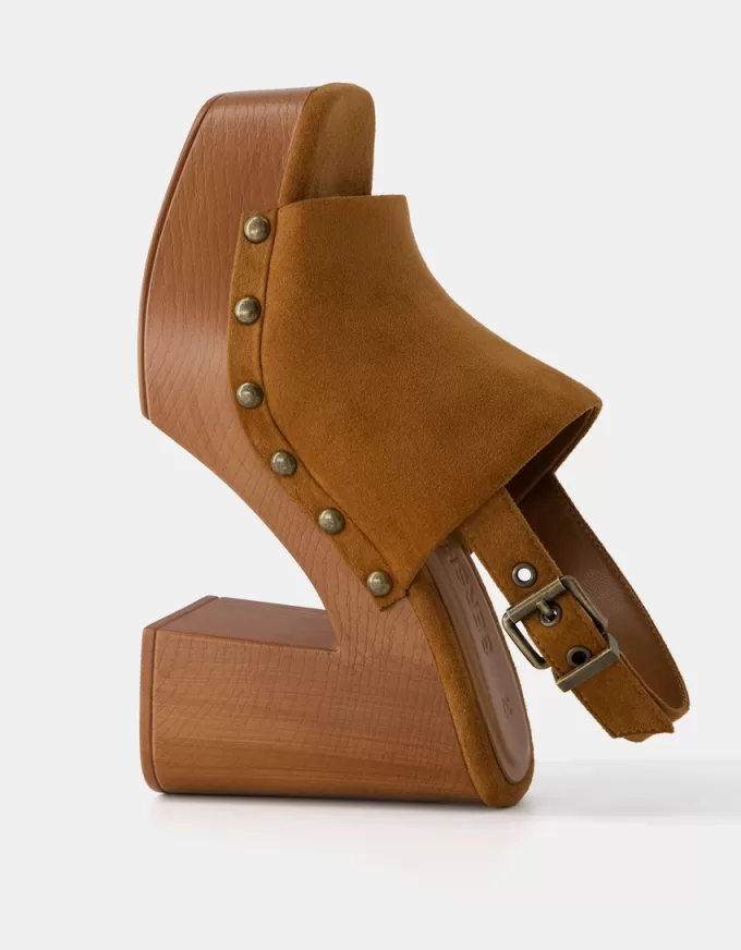 High-heel studded platform clogs
