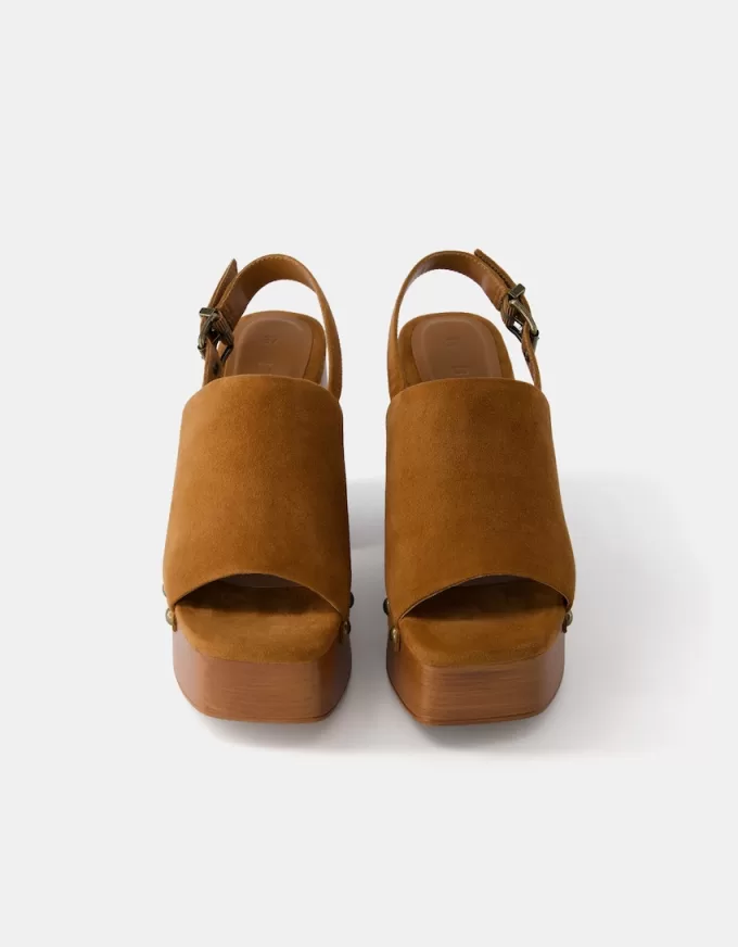 High-heel studded platform clogs