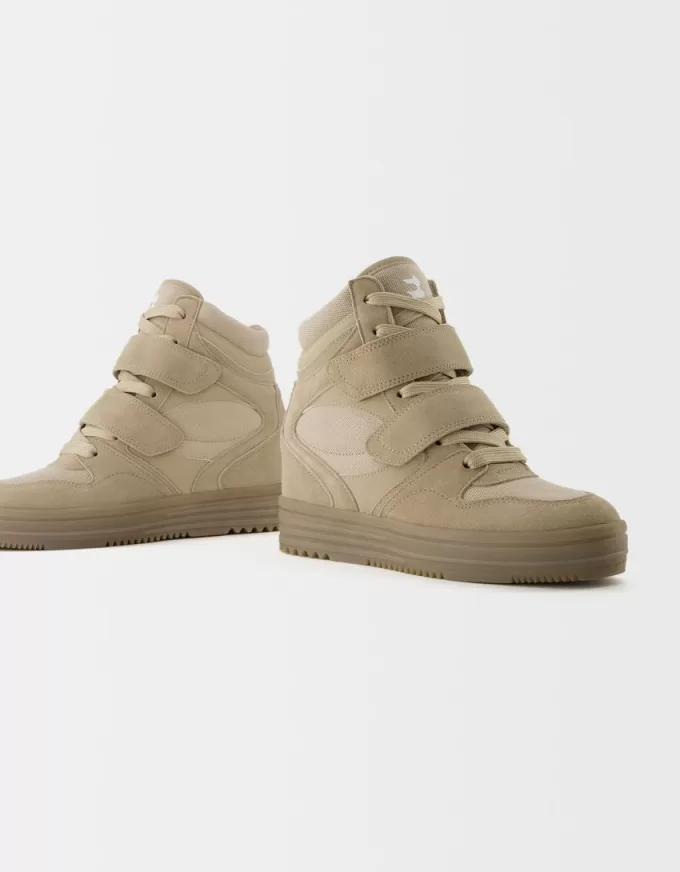 High-top sneakers with inner wedge