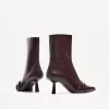 Kitten-heel ankle boots with buckles Kitten-heel ankle boots with buckles