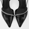 Kitten-heel shoes with chain detail Kitten-heel shoes with chain detail