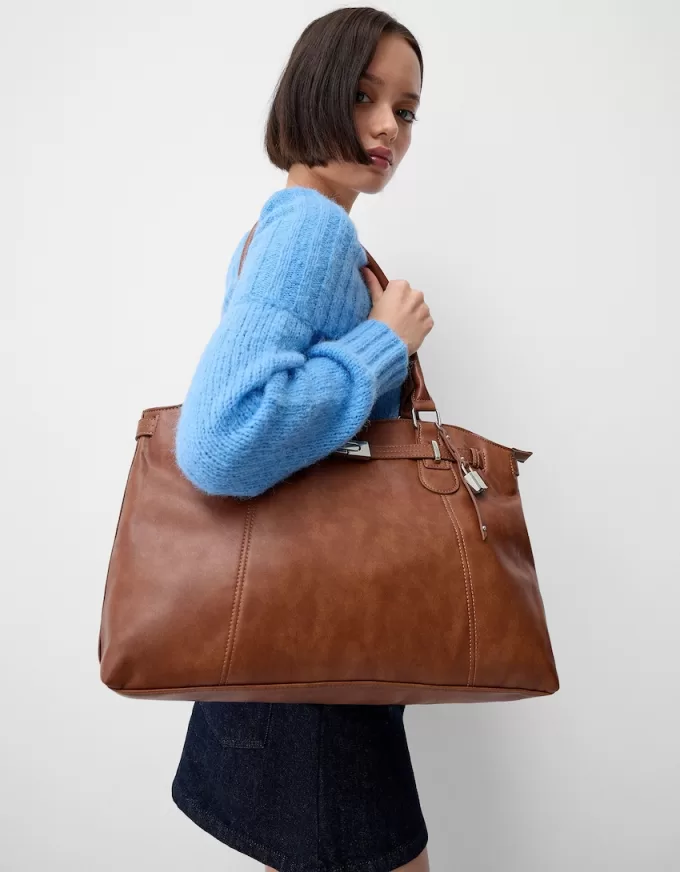 Leather effect bag with beads