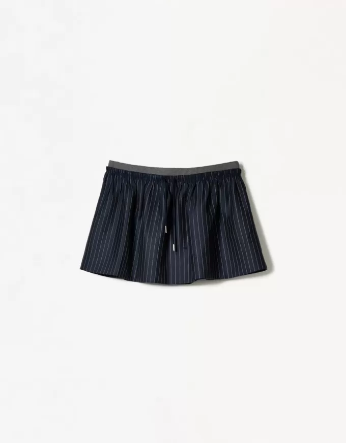 Mini skirt with contrast waist