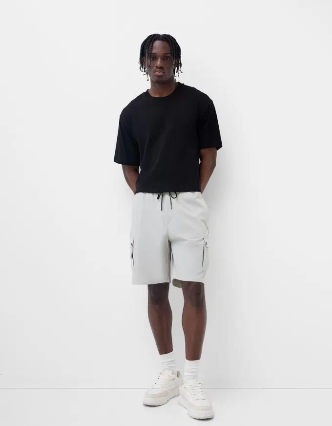 Multi-cargo technical Bermuda shorts