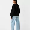 Oversize sweatshirt with side pockets