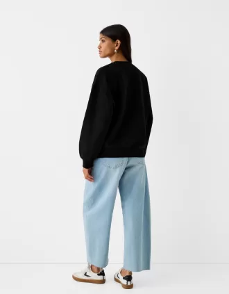 Oversize sweatshirt with side pockets