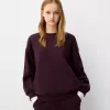 Oversize sweatshirt with side pockets