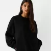 Oversize sweatshirt with side pockets